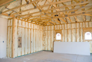 Insulated room under construction with framing